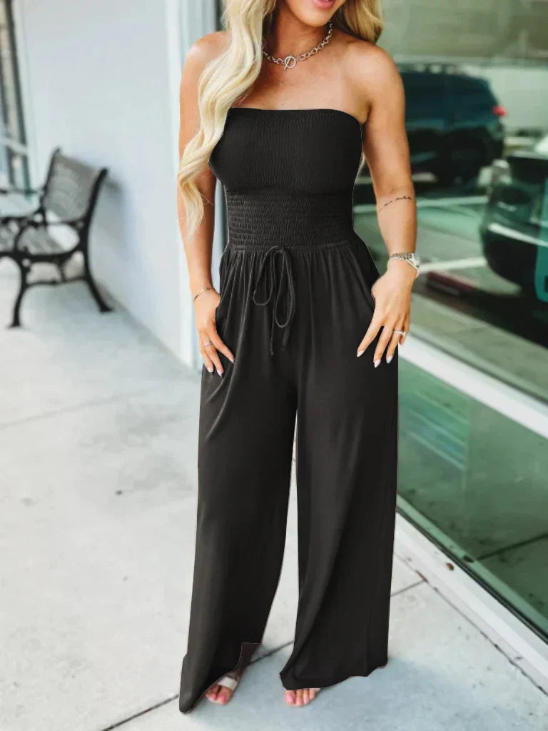Dam Jumpsuit i Smockad Design av Högkvalitativt Material